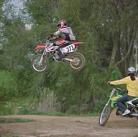 Eli Buss catching big air on his dirtbike #373 — soul flies high but safety is always number one