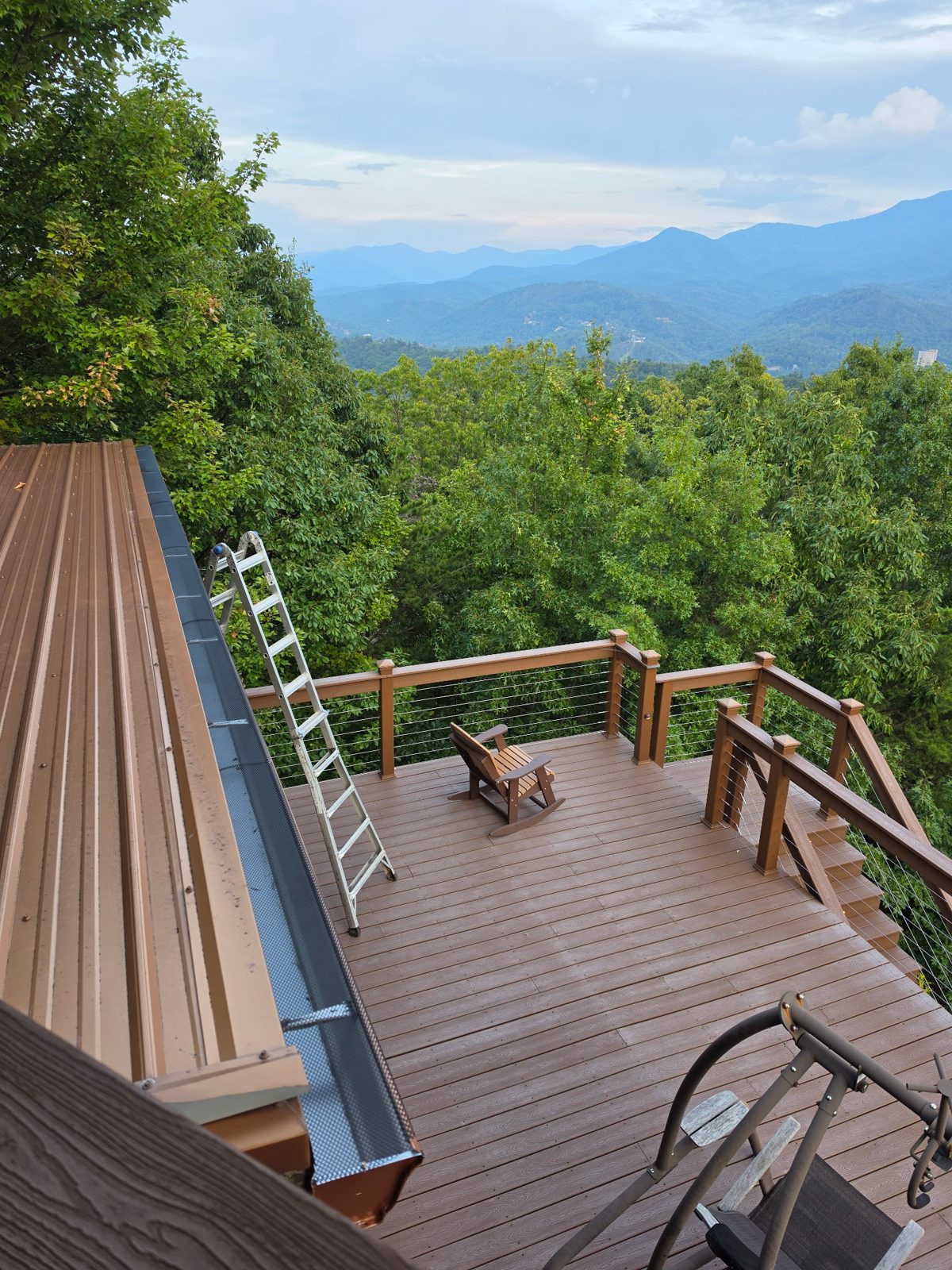 The same gutter and guard run above the deck, seen from another angle.